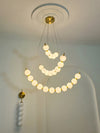 Modern Curved String Chandelier Copper PMMA Shade Multi - tiered combination